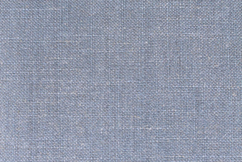 Soft blue Siena Sky fabric on upholstered bed