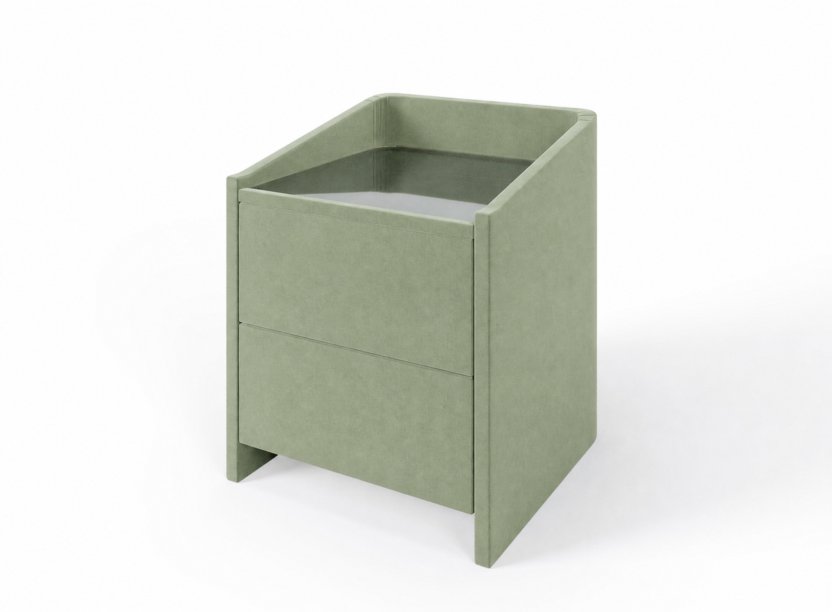 Lydie upholstered bedside table in Aston Sage with glass top and two drawers