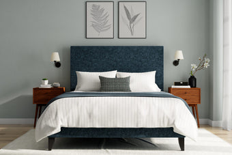 The Button Box Upholstered Bed with a luxurious button-tufted headboard and high-quality fabric upholstery