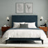 The Button Box Upholstered Bed with a luxurious button-tufted headboard and high-quality fabric upholstery