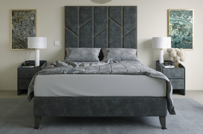 The Chelsea Bed featuring plush upholstery and a unique metal zigzag trim