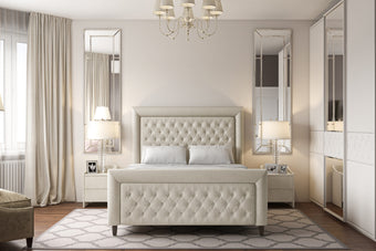 The Cambourne Bed featuring a high footboard and intricate buttoning detail with plush upholstery