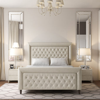 The Cambourne Bed featuring a high footboard and intricate buttoning detail with plush upholstery