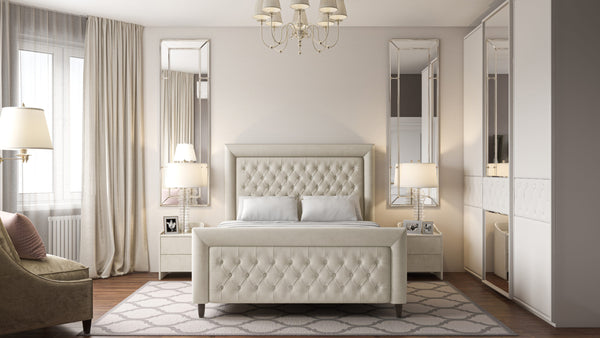 The Cambourne Bed featuring a high footboard and intricate buttoning detail with plush upholstery