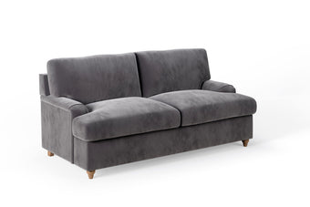 The Milly Sofa Bed featuring a T-cushion design and luxurious upholstery