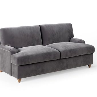 The Milly Sofa Bed featuring a T-cushion design and luxurious upholstery