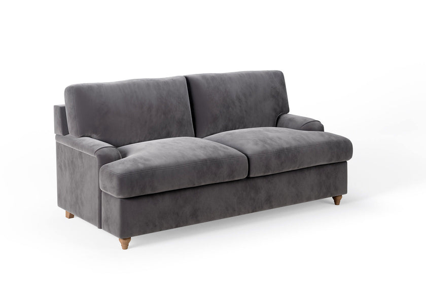 The Milly Sofa Bed featuring a T-cushion design and luxurious upholstery