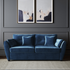 The Sofia Velvet Blue Sofa Bed featuring elegant upholstery and seamless conversion from sofa to bed