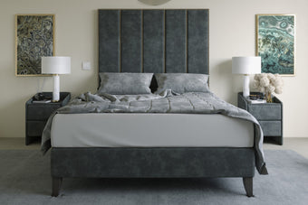 The Kipling Bed featuring plush upholstery and sleek metal trim