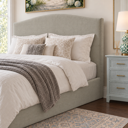 Close view of the Snoozer Double 4'6 electric ottoman in Aston Natural showing the curved headboard and upholstered base