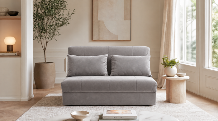Mia sofa bed in Koala light grey velvet with two scatter cushions