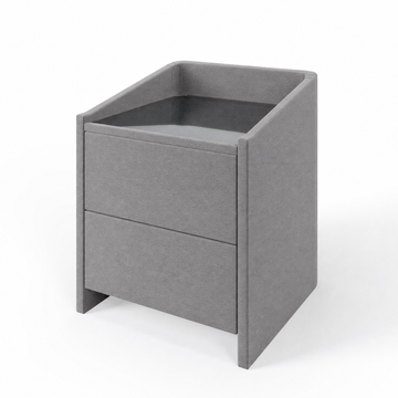 Lydie upholstered bedside table in Grey with glass top and two drawers