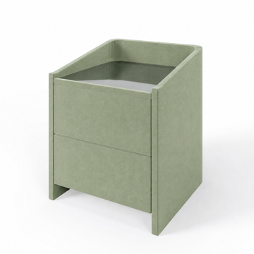 Lydie upholstered bedside table in Aston Sage with glass top and two drawers